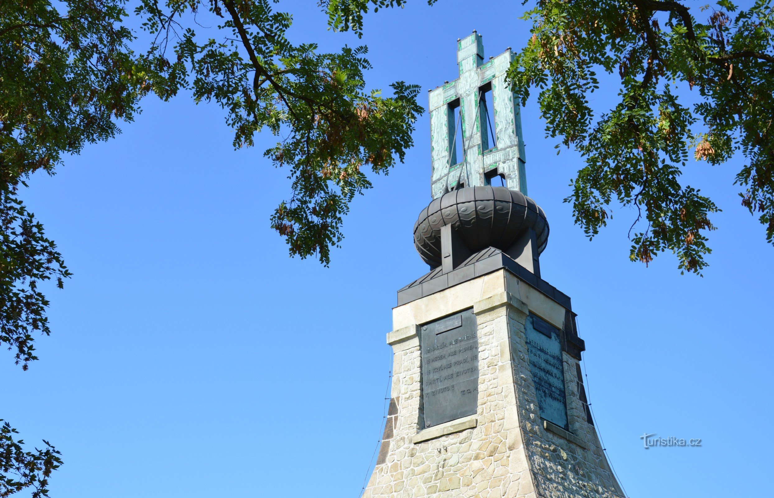 Old Christian cross on the monument