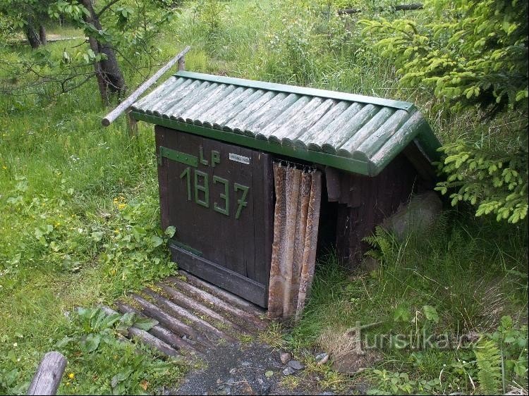 Well in the throat: One of the wells on the Jinošov well trail.