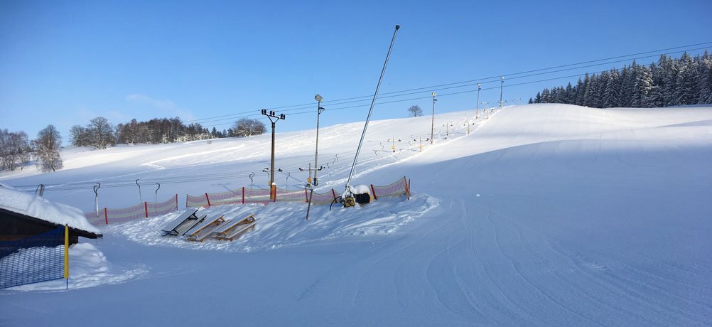 Valoisa rinteiden yläosa