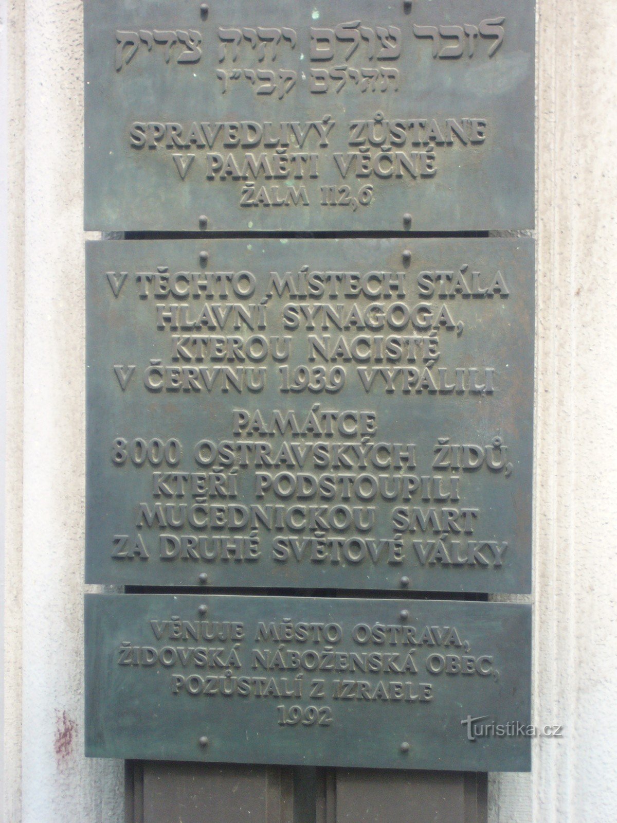 Plaque text