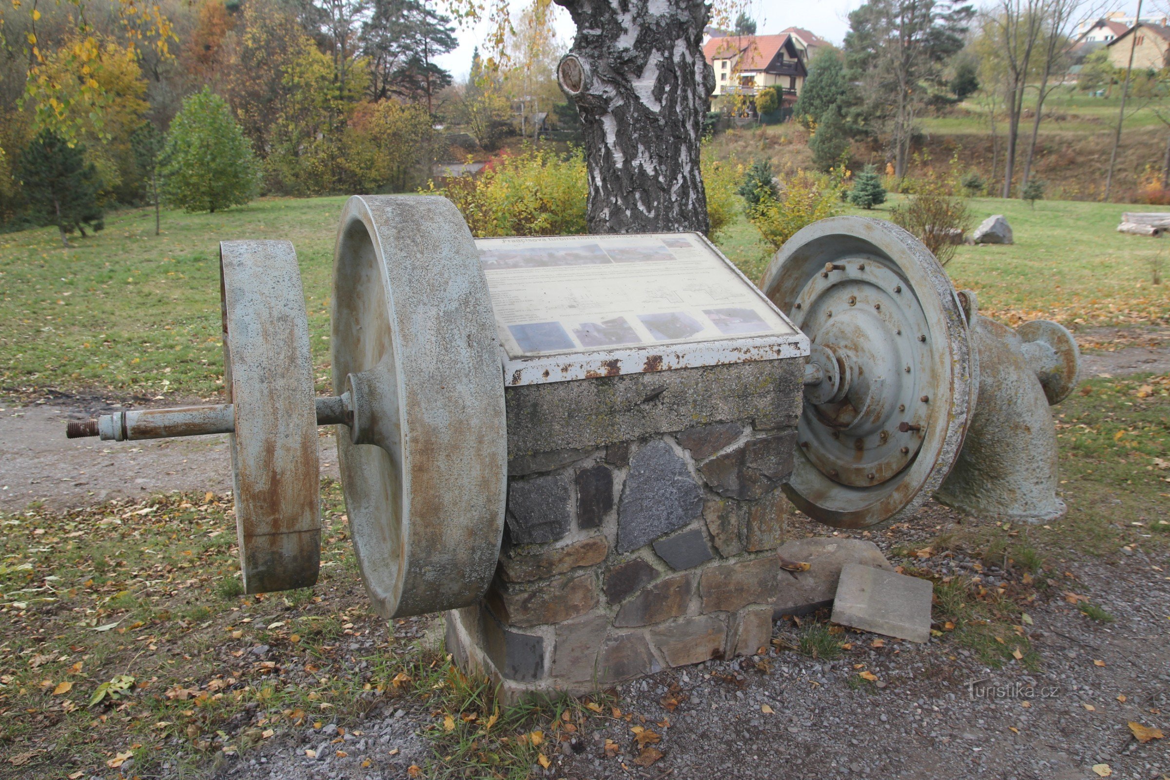 The turbine is installed next to the road leading to the campsite, and there is also an info station next to it