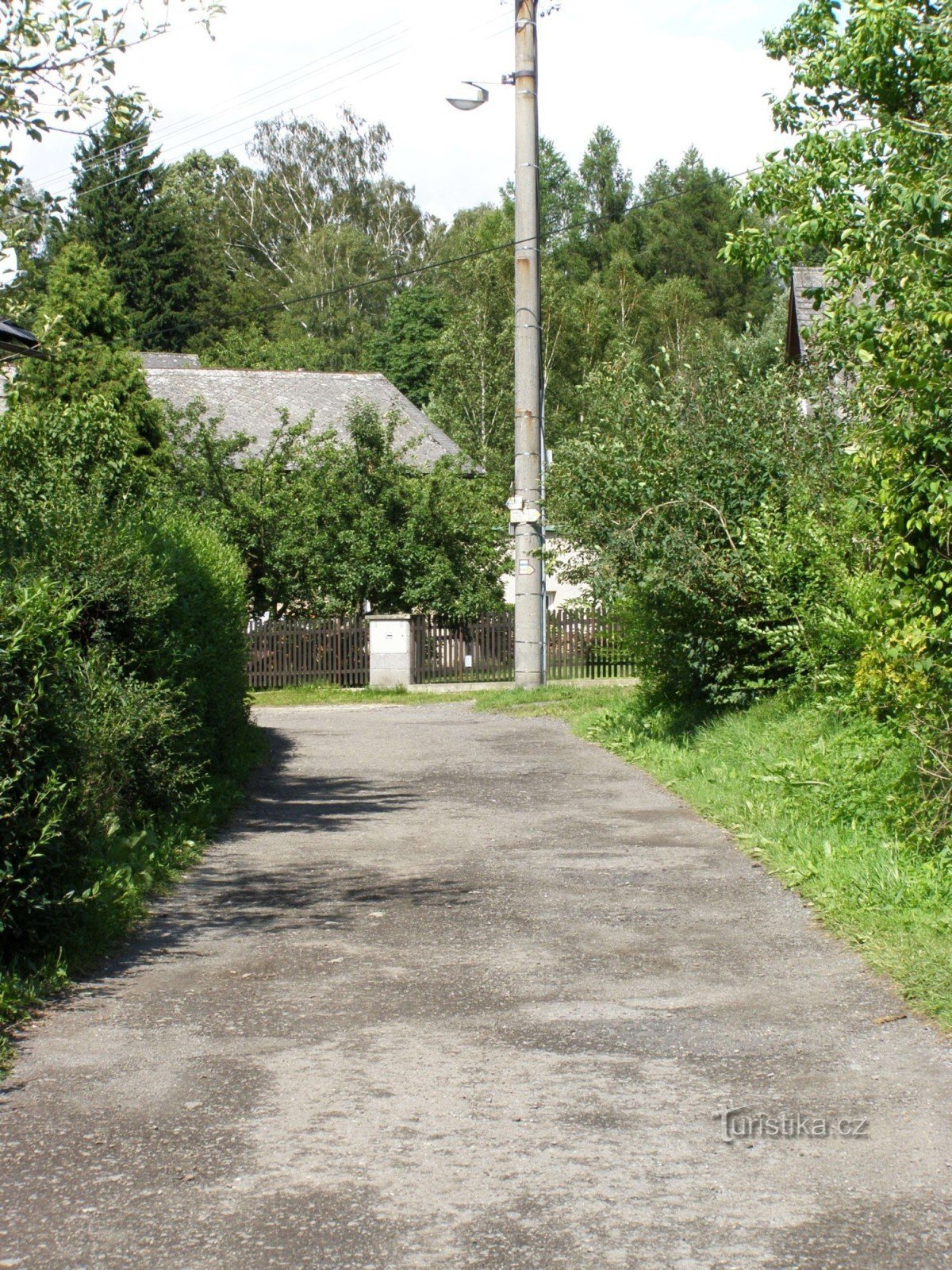 turistkorsning Sloup - till kyrkogården