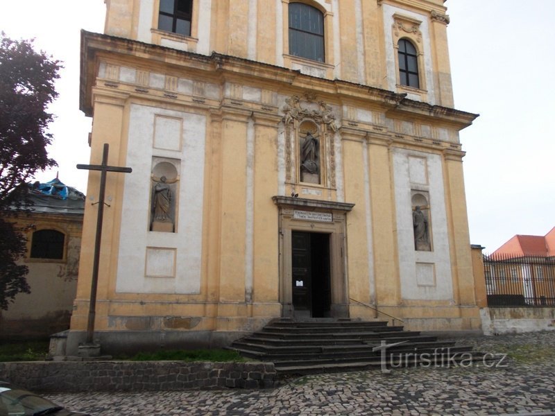 entrance to the church, cross in front of the church