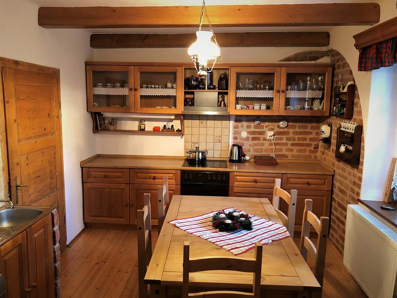 Large apartment kitchen with dining table