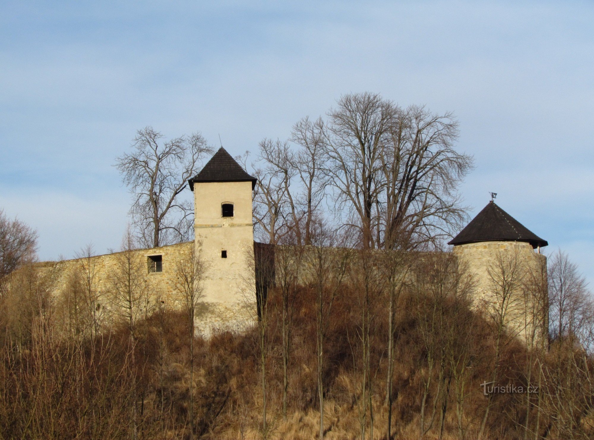 A view of Brumovsk Castle, the town and the bordering White Carpathians