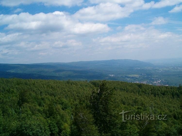 Razgled: Pogled na Rudne gore in Hrob, Dubí in Krupko v vznožju