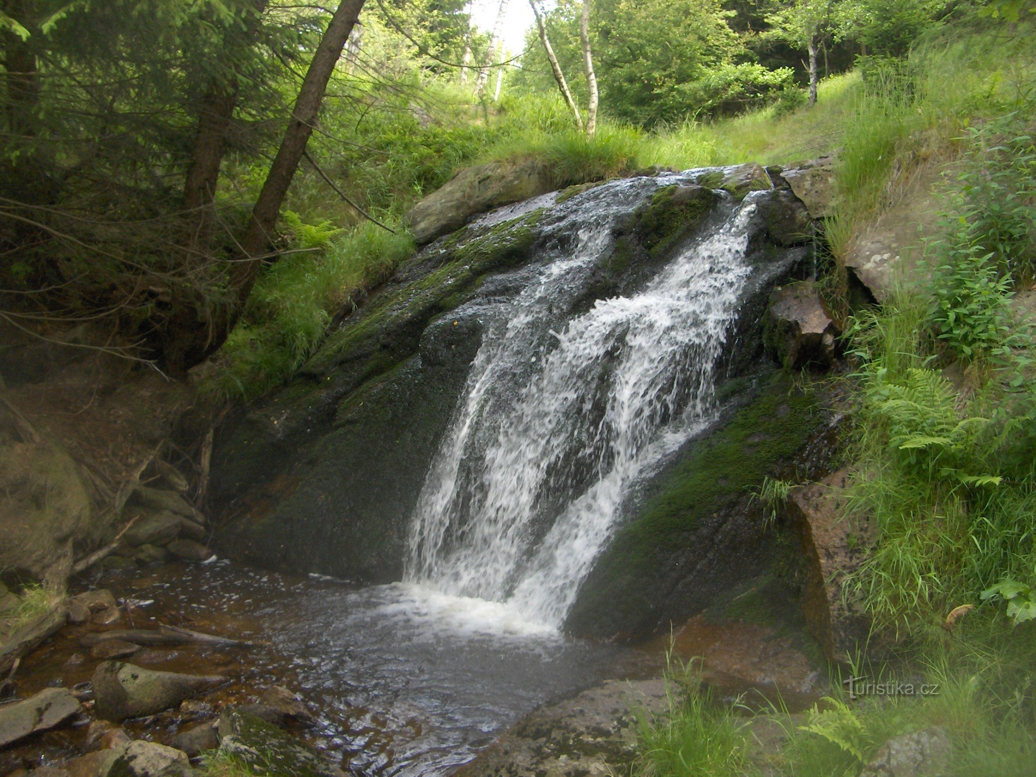 Behind the waterfall to the Ore Mountains.