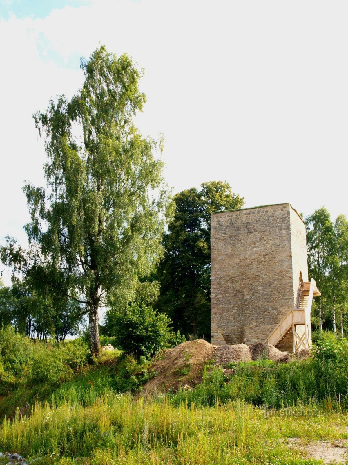 Shot of the reconstructed fortress tower from the pond