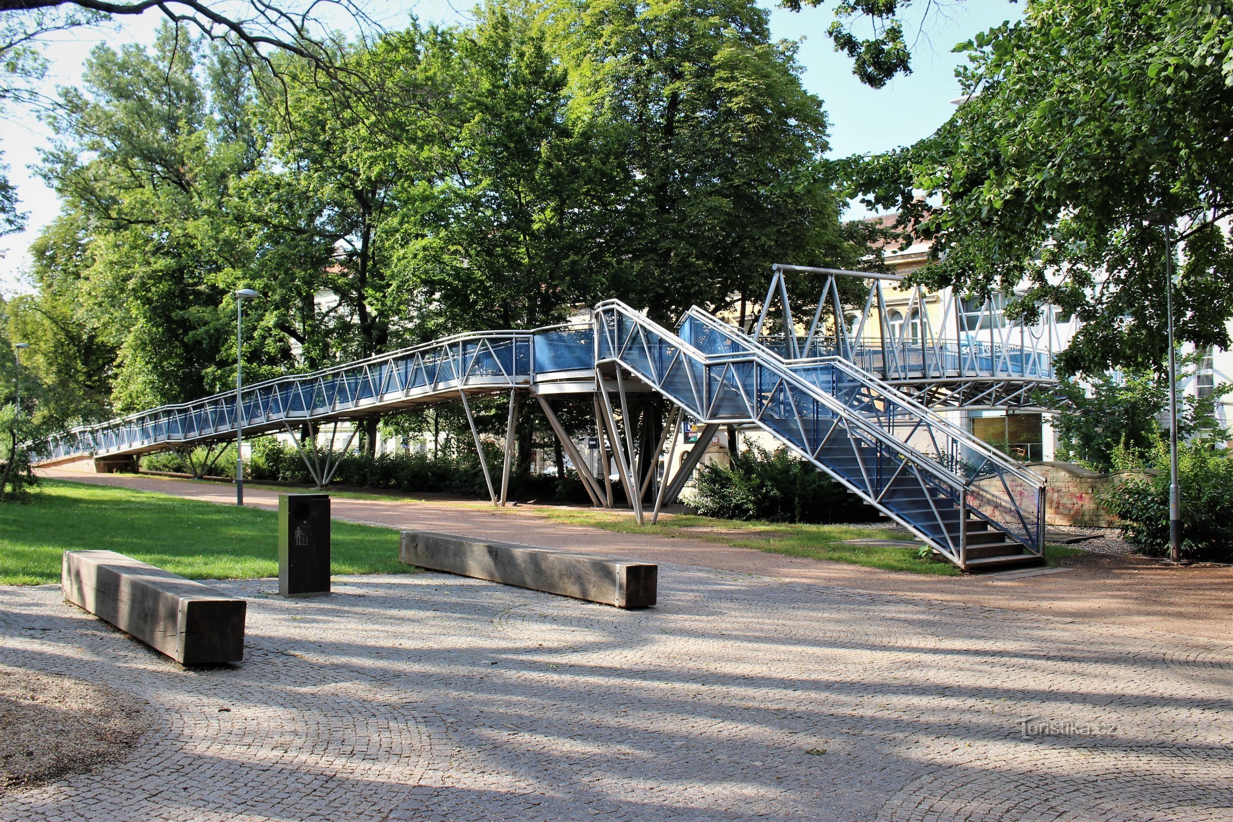 The beginning of the footbridge in the park near the Janáček Theater