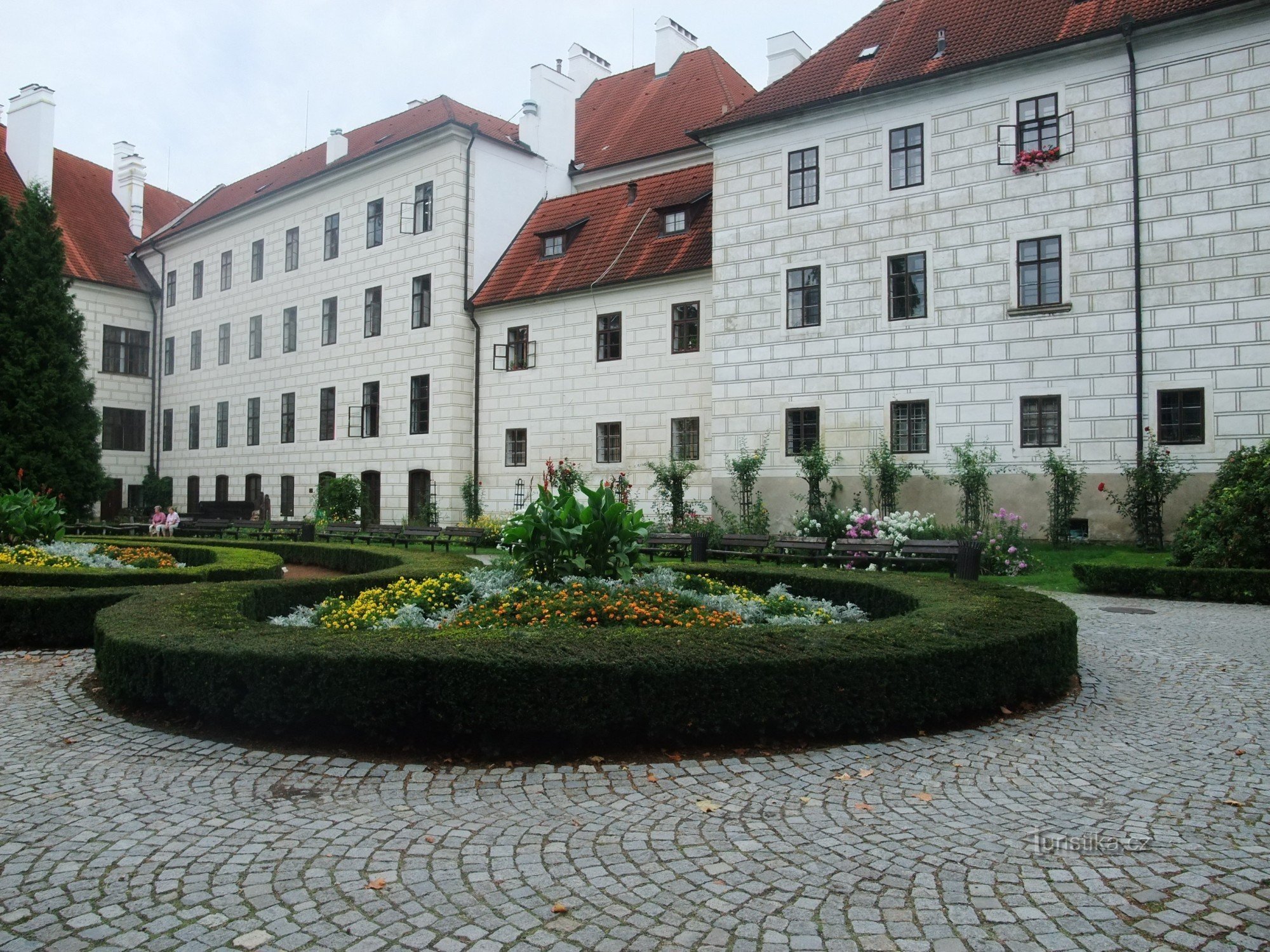 A castle with an ornamental garden