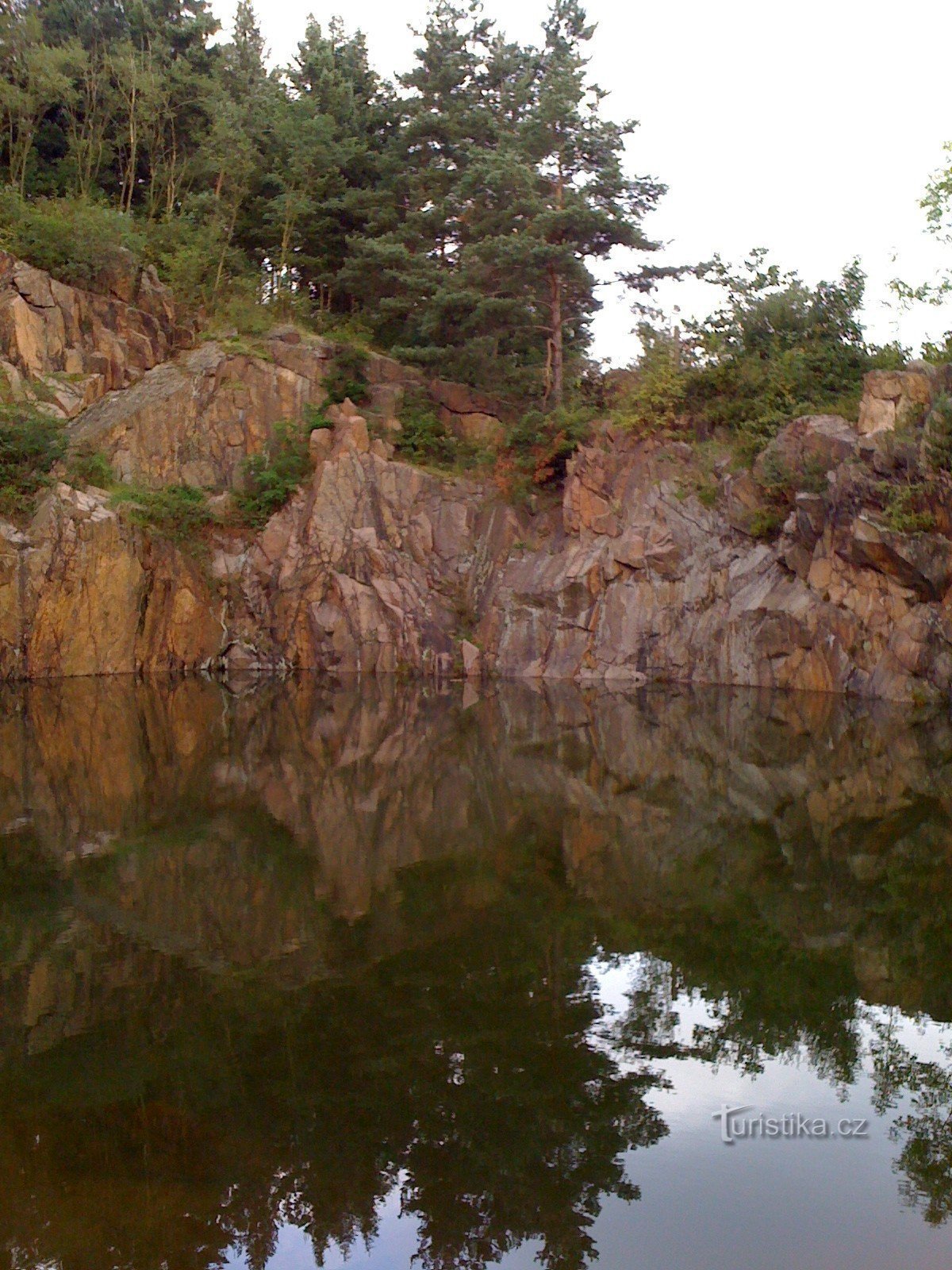 Flooded quarry and rocks