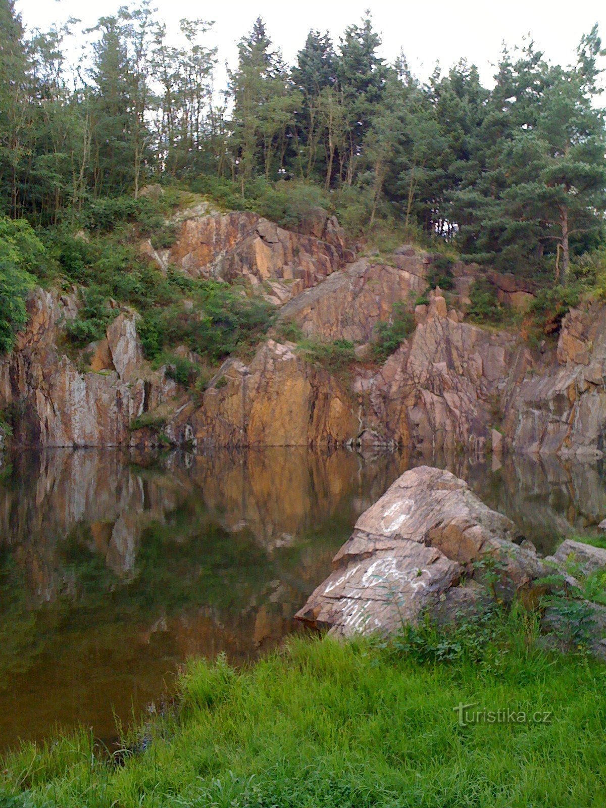 Flooded quarry and rocks