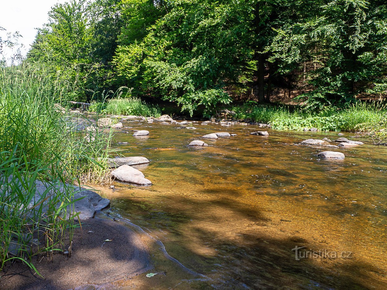 At first, the stones in the river are smaller