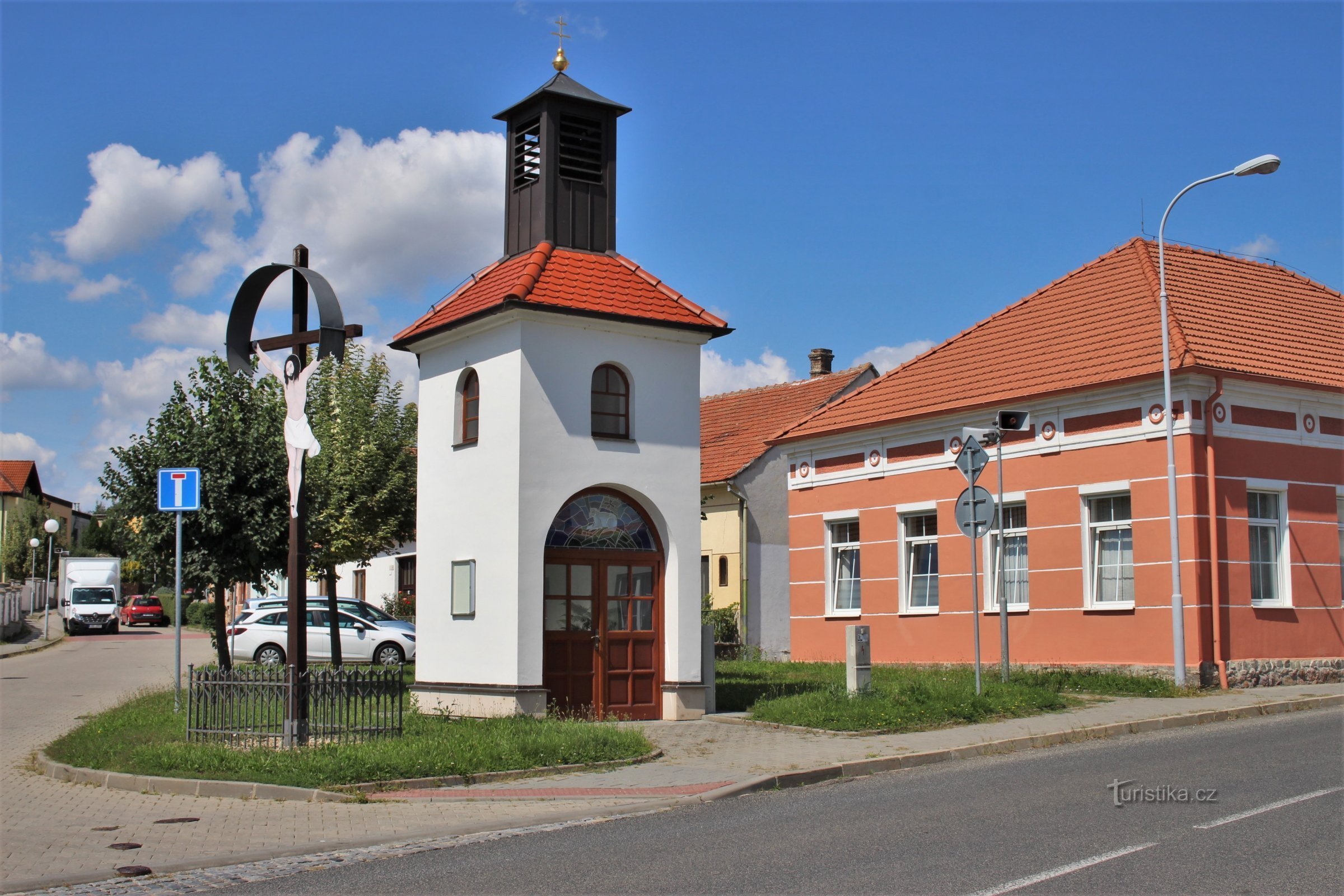 Bell tower with a wooden cross